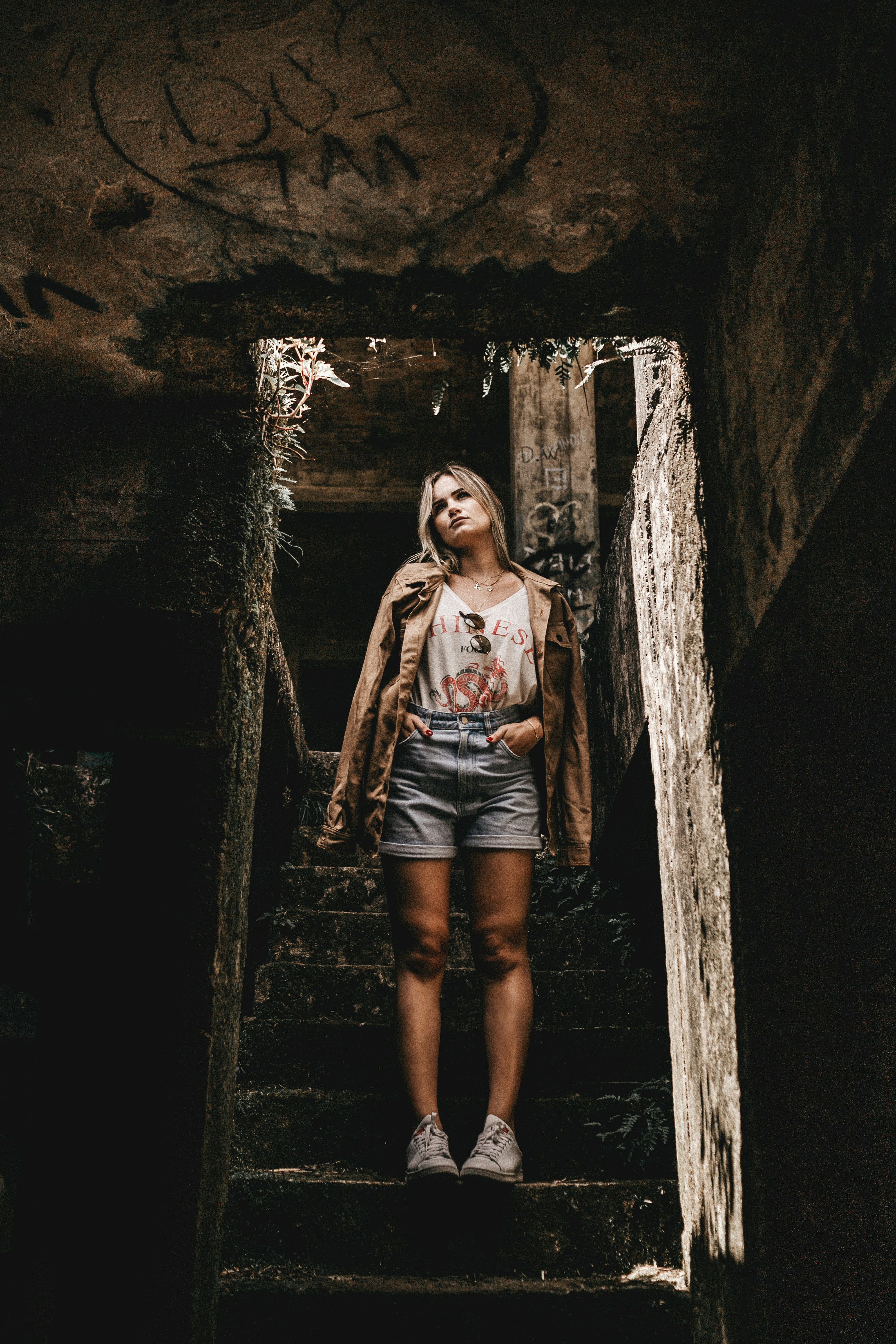 woman standing on stairs